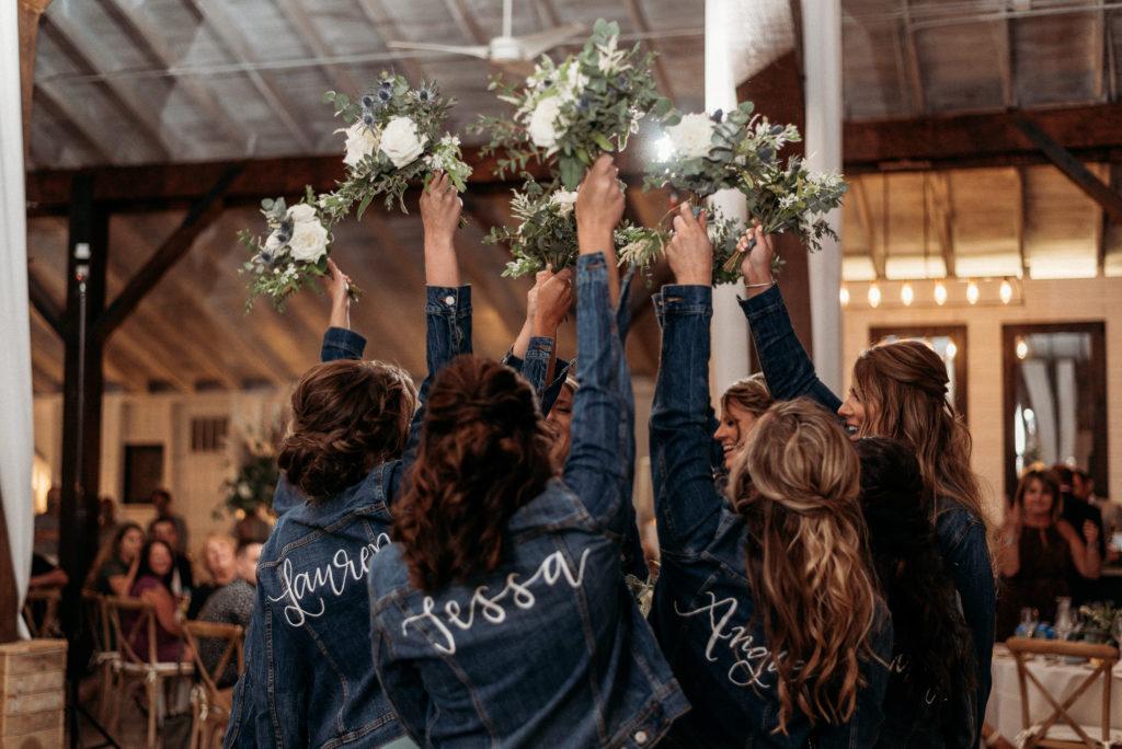 wedding at White Willow Farms - bridal party with denim jackets
