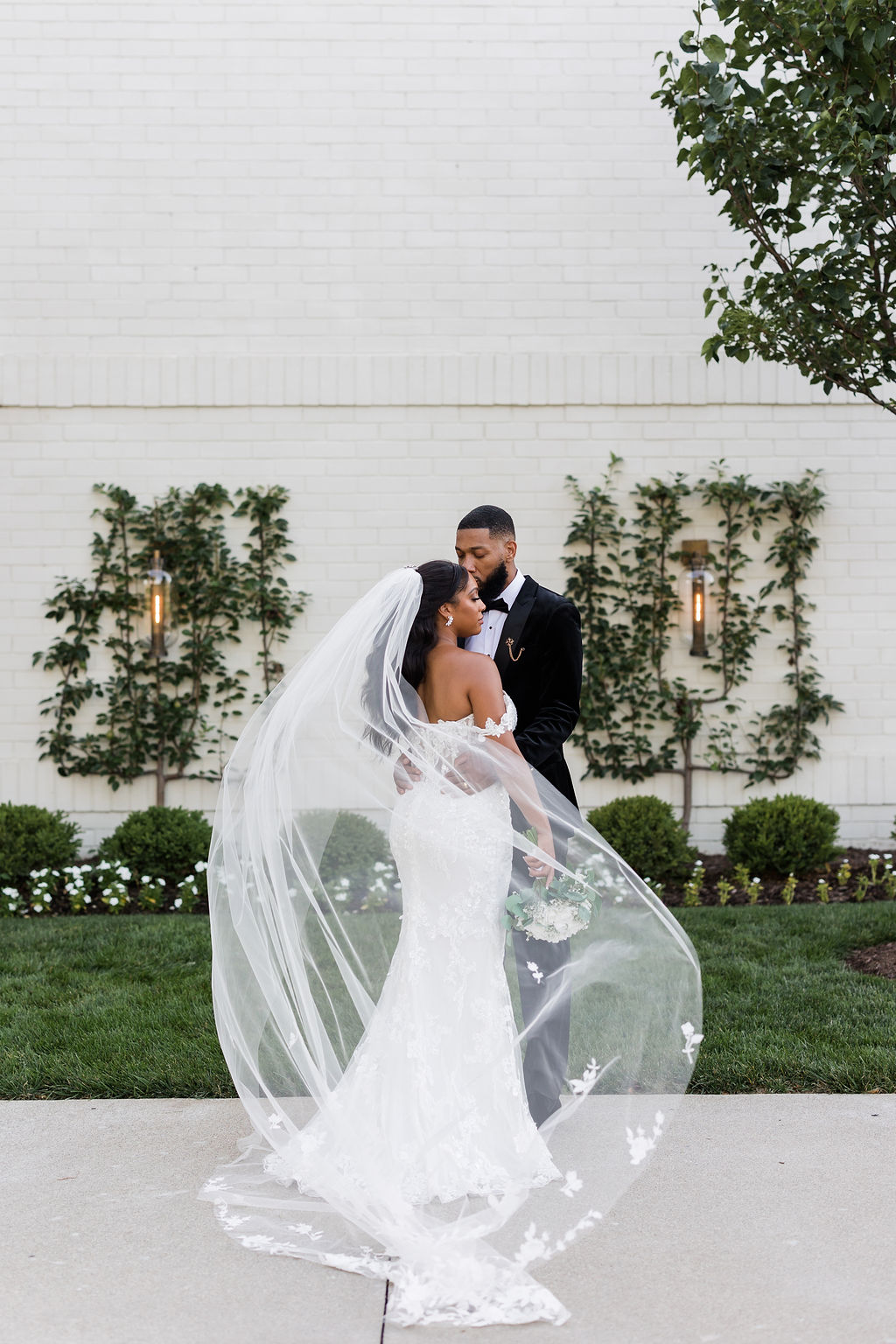 ritz charles courtyard wedding just married couple