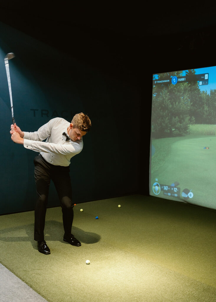 Iron and Ember golf simulator in groom's suite