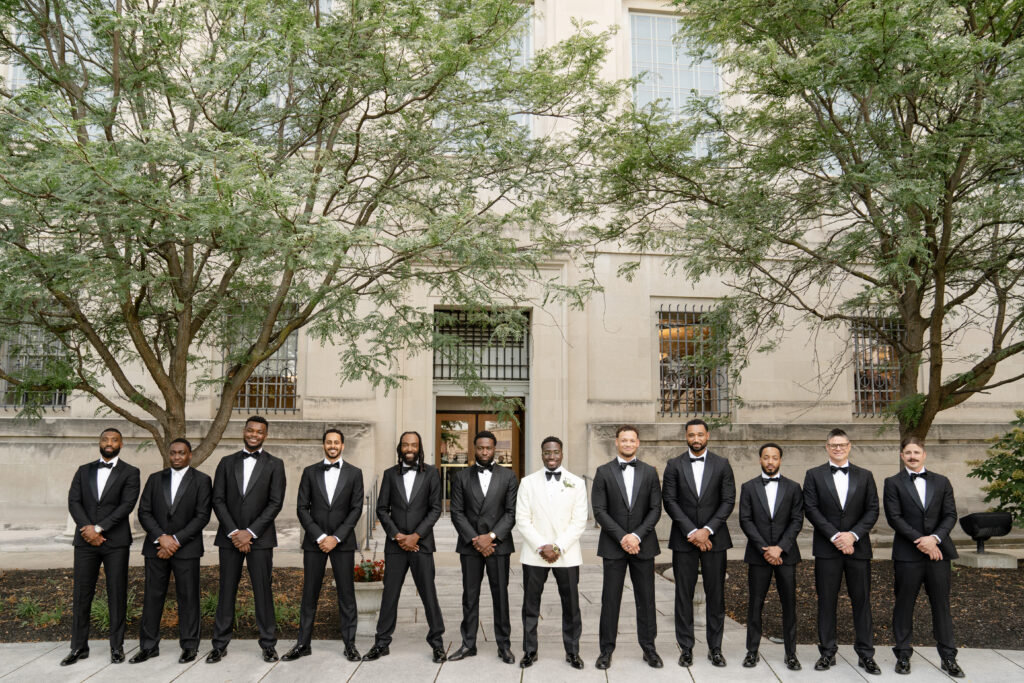 Groomsmen in the courtyard at the wedding at the Indianapolis public library