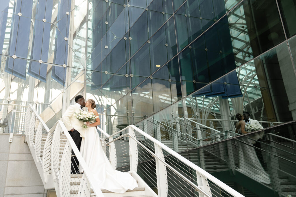 newlywed couple portrait photo in the atrium of the Indianapolis public library