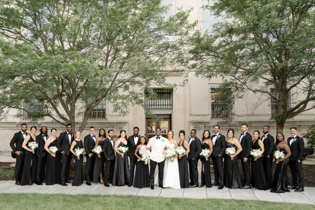 black and white wedding party portraits photos in the courtyard at the Indianapolis public library