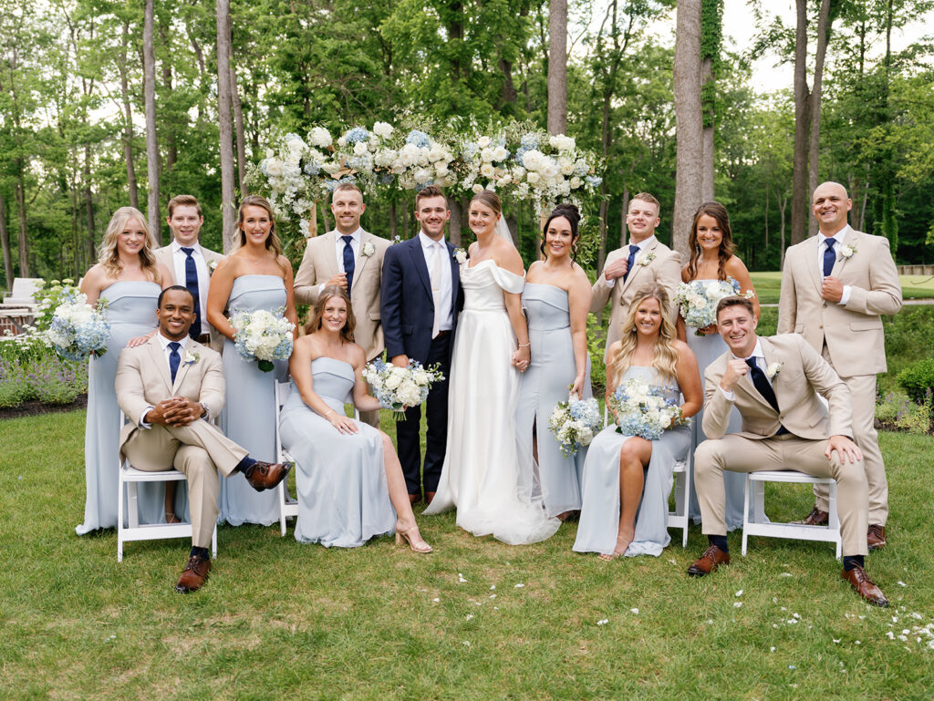 light blue bridesmaids with khaki groomsmen suits