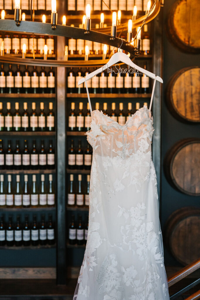 Dress hanging on wine wall at Daniel's Vineyard