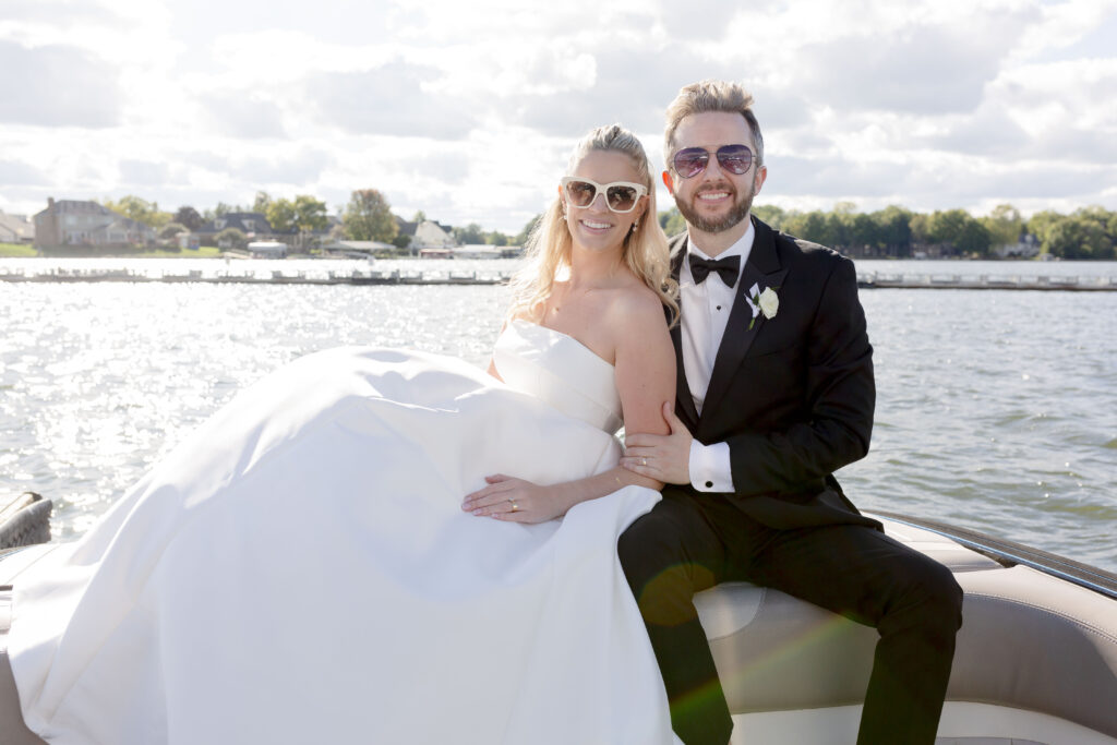 Morse Lake Wedding newlyweds on boat