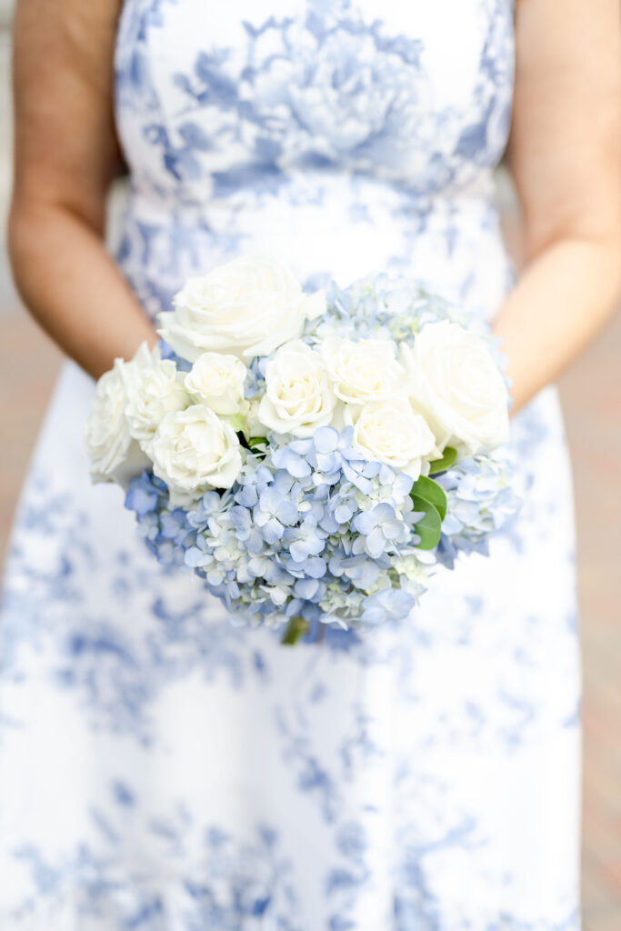 Blue and white bridesmaid dress with hydrangeas