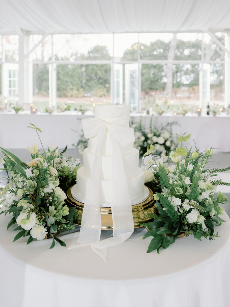 Ritz Charles Garden Pavilion in Carmel, Indiana with 3 tier wedding cake with a bow