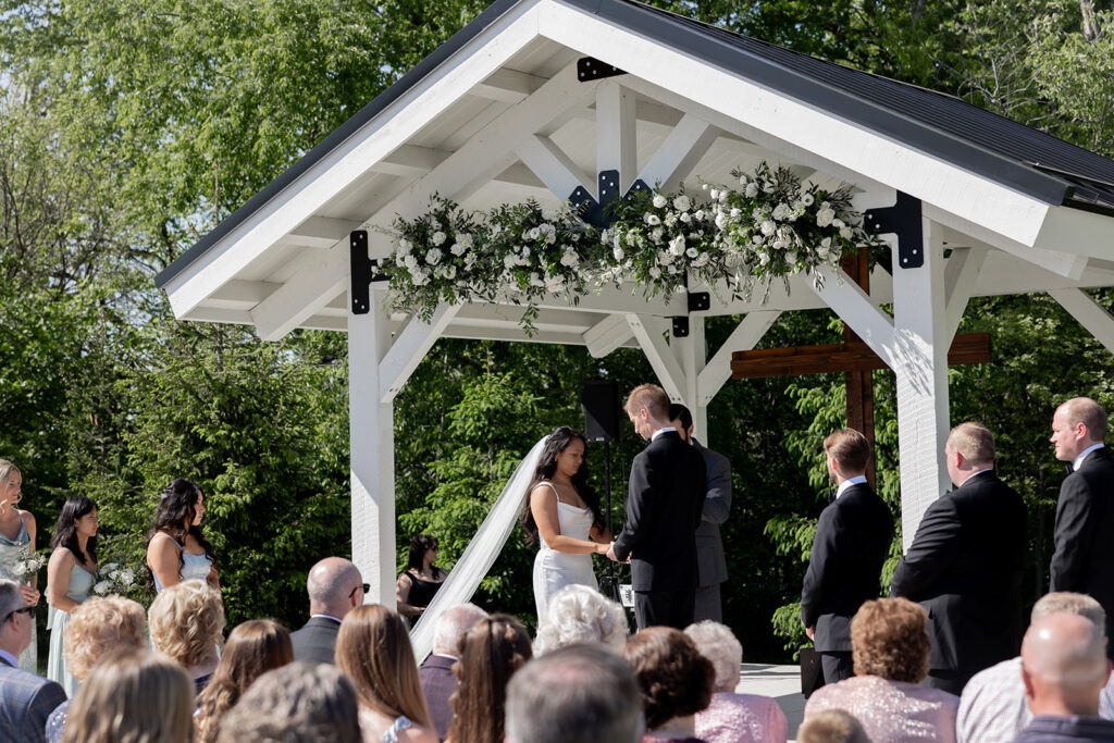 The Sixpence wedding outside