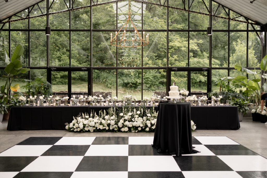 black and white summer wedding at conservatory at evergreen with checkered dance floor